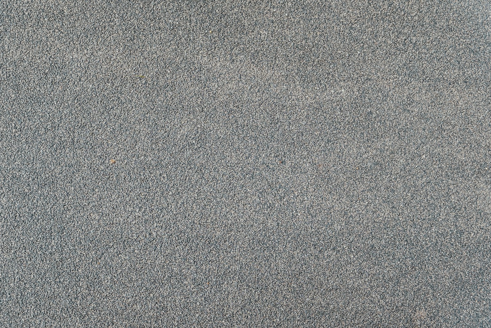 Close up of grey asphalt texture.